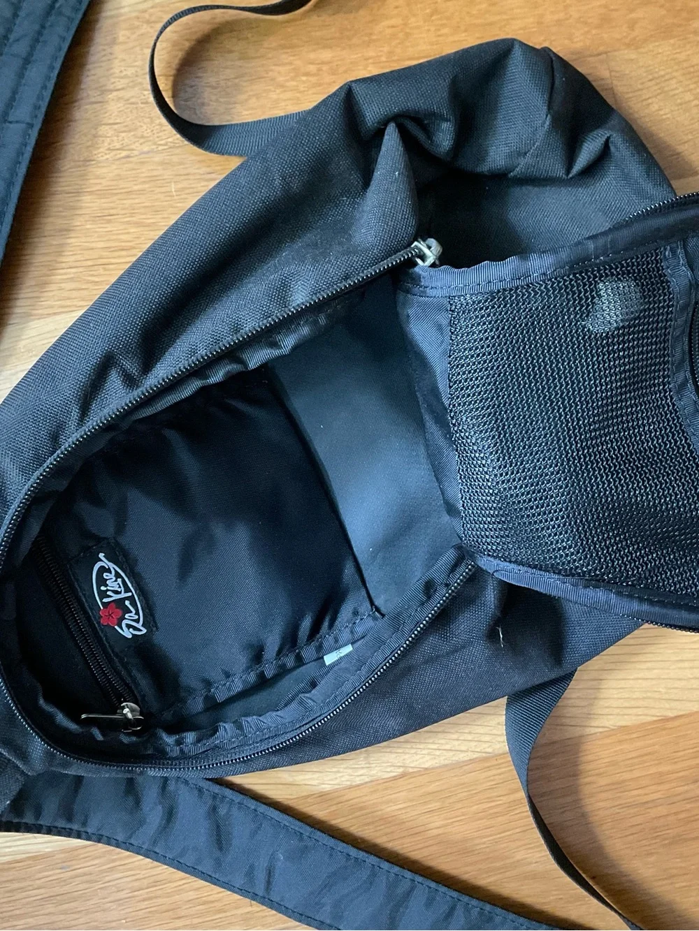 Dakine Blue and Black Sling Backpack with Front Bungee